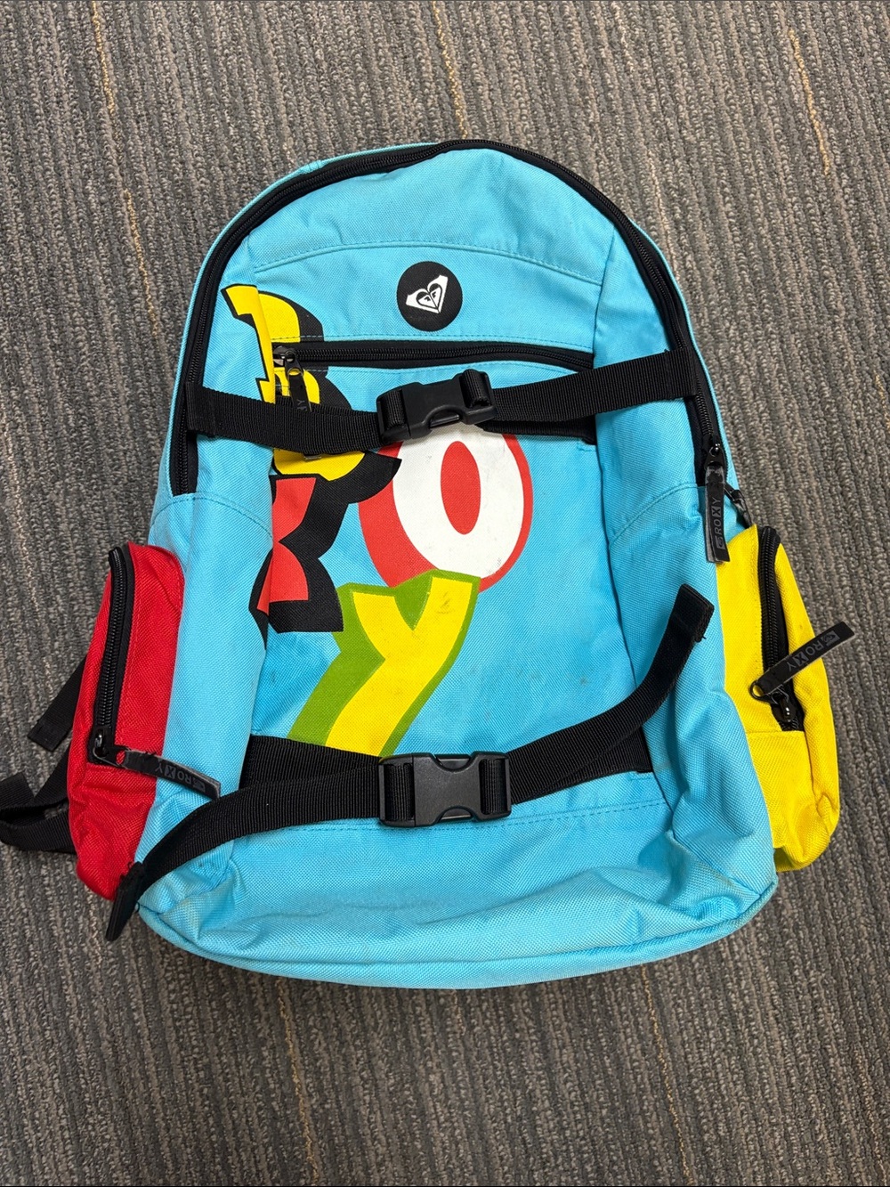 Womens Roxy Blue Backpack with Red & Yellow Pouches